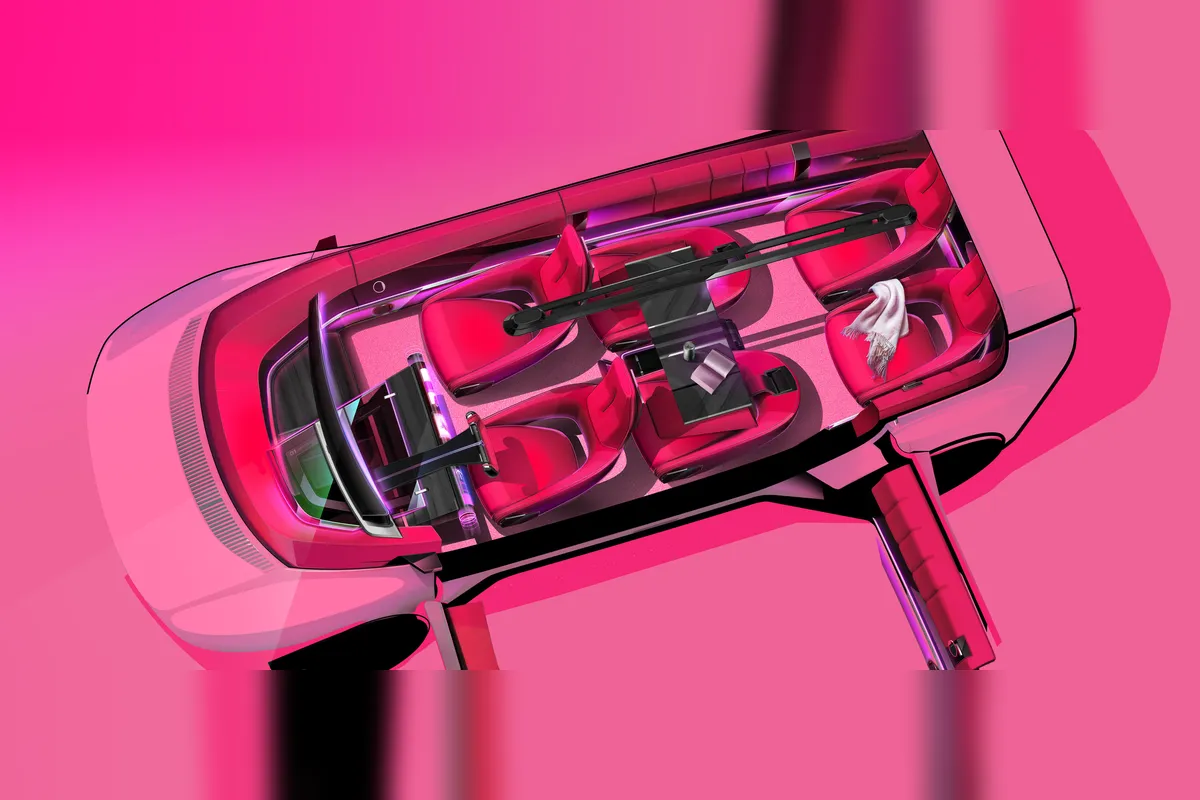 E-Space Concept von oben ohne Dach: sechs Sitze, in der zweiten Reihe umgeklappt zu dunklen Tischflächen.
